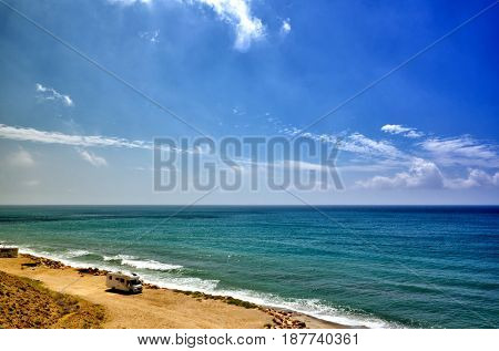 Holiday at the sea in a caravan, free camping on the beach with a motorhome