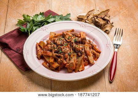 seitan stew with dried mushroom and tomatoes sauce
