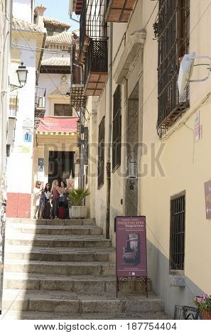 GRANADA, SPAIN - MAY 20, 2017: Some women in front of the Palace of the Forgotten in the quarter of Albayzin in Granada Andalusia Spain.