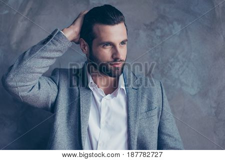 Confident Pensive Handsome Brunette Bearded Young Man Is Looking Away Wearing Formal Wear, Fixing Hi