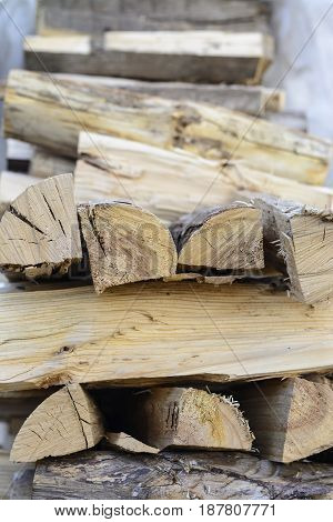 firewood background - split hardwood kiln-dried. split firewood in the stack