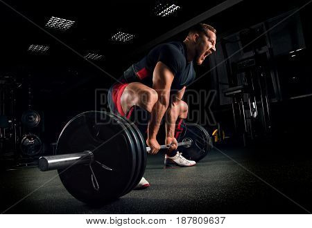 Athlete Screams To Motivate Himself To Perform An Exercise Called Deadlift