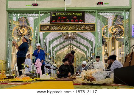 Photo of Masjid Sultan at Muscat Street in Kampong Glam district of Rochor Planning Area in Singapore. Muslim prayers inside the mosque. MARCH 2017