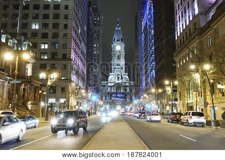 Philadelphia street view at night with city hall  -  2017