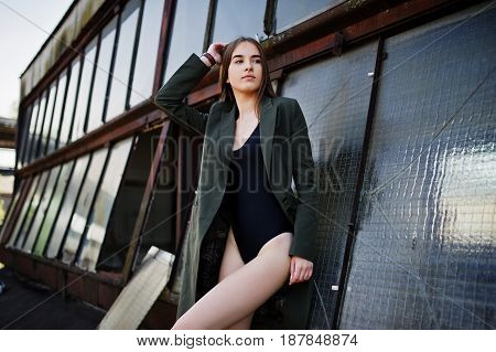 Sexy Model Girl Wit Long Legs At Black Lingerie Outfit Body Swimsuit Combidress And Jacket Posed At