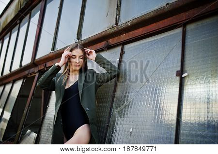 Sexy Model Girl Wit Long Legs At Black Lingerie Outfit Body Swimsuit Combidress And Jacket Posed At