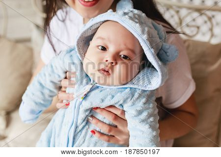 Portrait of a little adorable newborn infant asian baby.