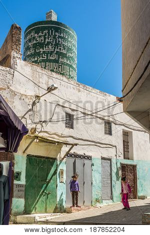 MOULAY IDRISS ZERHOUN, MOROCCO - APRIL 7,2017 - In the streets of Moulay Idriss. Moulay Idriss is a town in northern Morocco is spread over two hills at the base of Mount Zerhoun.