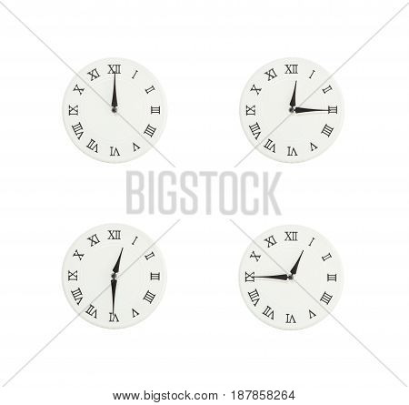 Closeup group of white clock with shadow for decorate show the time in 12 12:15 12:30 12:45 a.m. isolated on white background beautiful 4 wall clock picture in different time