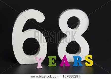Letters And Numbers-sixty-eight On A Black Background.
