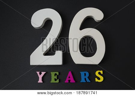 Letters And Numbers Twenty-six Years On A Black Background.