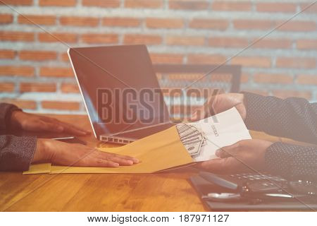 Bribes being offered in a business situation