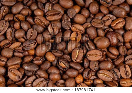 Macro photo of rosated coffee beans background