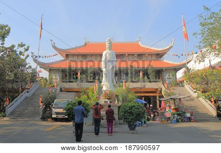 HO CHI MINH CITY VIETNAM - NOVEMBER 28, 2016: Unidentified people visit Vinh Nghiem pagoda temple Ho Chi Minh City Saigon Vietnam