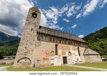 Ancient Church Of San Vigilio (1515) In Pinzolo, Trento, Italy With The Famous Fresco La Danza Macab