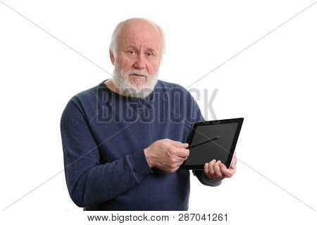 Funny bald and bearded old man using tablet computer, isolated on white