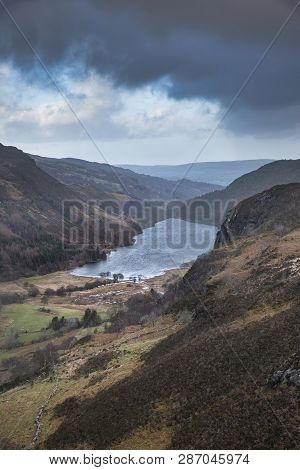 Landscape Image Of View From Peak Of Crimpiau Towards Llyn Crafnant In Snowdonia