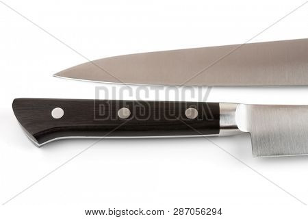 Knife blade and handle on white background, fragment, close-up