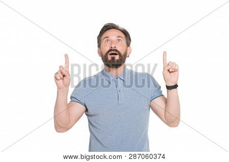 Whats There. Portrait Of Surprised Bearded Man Looking Up With Interest While Keeping His Mouth Open