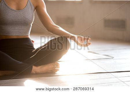 Young Sporty Yogi Woman Practicing Yoga, Doing Easy Seat Exercise