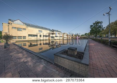 The Hague, 7 May 2018 - Reflection Of The Museon, The Municipality Museum Under A Blue And Shiny Spr