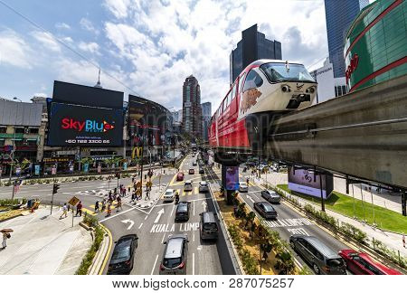 Kuala Lumpur, 29 July 2018 - The Monorail Train Runs, Operates At The Bukit Bintang Station In Front