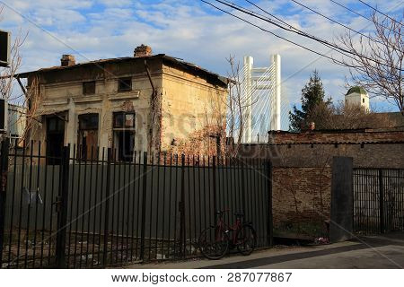 Bucharest, Romania - December 11, 2016: An Abandoned House Is Seen In Front Of 