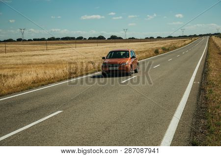 Road Through Rural Landscape And Car Near The Monfrague National Park