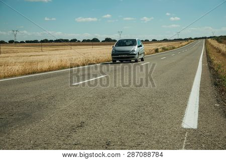 Road Through Rural Landscape And Car Near The Monfrague National Park
