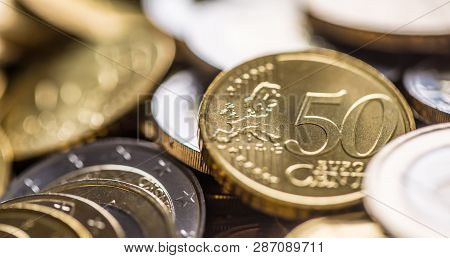 Close-up A Pile Of New Euro Coins In Other Compositions