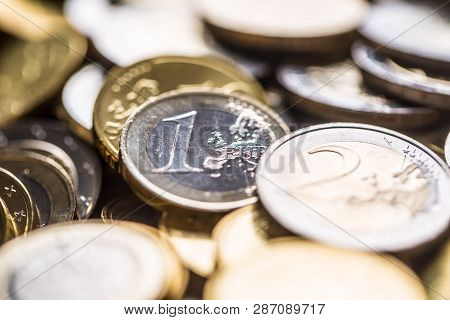 Close-up A Pile Of New Euro Coins In Other Compositions
