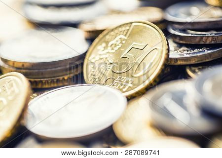 Close-up A Pile Of New Euro Coins In Other Compositions