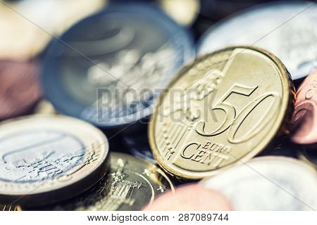 Close-up A Pile Of New Euro Coins In Other Compositions