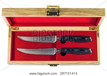 Steak Knife Set In A Wooden Box Isolated On White Background
