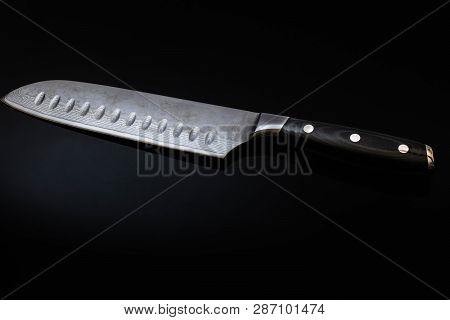Santoku Knife Isolated On A Black Background