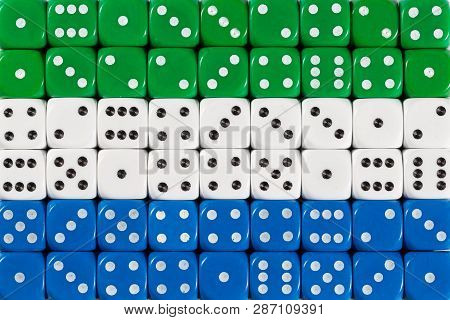 National Flag Of Sierra Leone In Colorful Background Of Dices