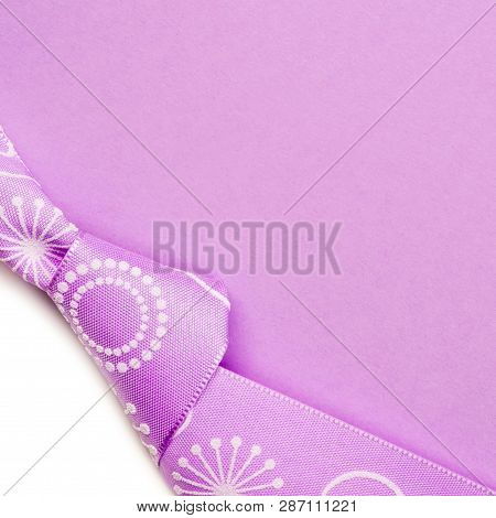 Birthday Gift Card With Violet Bow And Ribbon In The Middle Isolated And Violet And Blue Background 