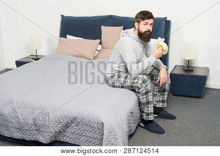 Man Bearded Hipster Sleepy Face Pajamas Waking Up Bedroom Interior. Daily Schedule For Healthy Lifes