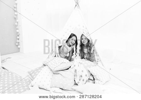 Girls Having Fun Tipi House. Girlish Leisure. Sisters Share Gossips Having Fun At Home. Cozy Place T