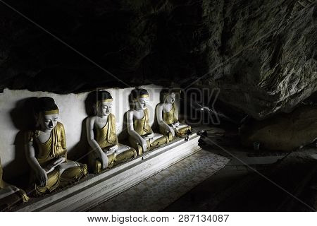Hpa-an, Myanmar - 19 November, 2018: Horizontal Picture Of Beautiful Sitting Buddha Statues At Yatha