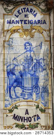 Lisbon - July 16, 2018:  Traditional Coloured Tiles Panel Used For Advertisement On The Streets Of L