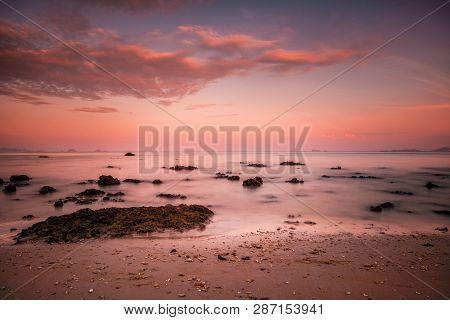 Softness Of The Waves And The Long Exposures Of Waves Like Coral Rocks That Emerge From The Fog And 
