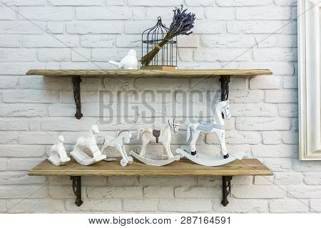 Interior Decoration Toys. White Decorative Wooden Latern Lights And Ceramic Horses In Expensive Inte