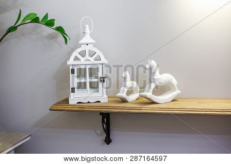 Interior Decoration Toys. White Decorative Wooden Latern Lights And Ceramic Horses In Expensive Inte