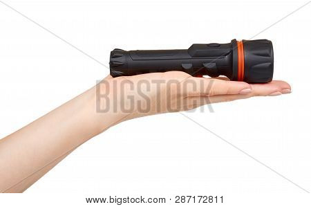Hand With Black Led Flashlight, Compact Lighting For Travel.