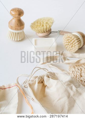 Dish Washing Brushes, Bamboo Toothbrushes, Reusable Bags. Sustainable Lifestyle Zero Waste Concept. 