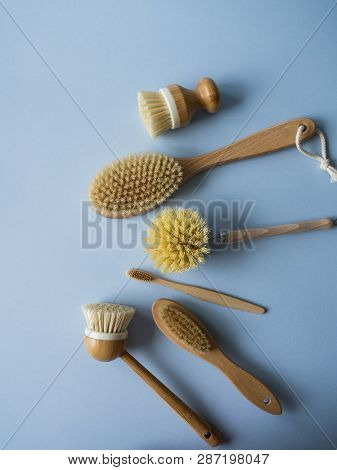 Dish Washing Brushes, Body Brush And Toothbrushes On Blue Background. Sustainable Lifestyle Zero Was