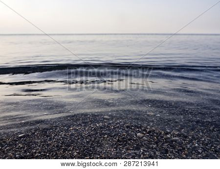 Waves And Beautiful Sunset On The Greek Island Evia (euboea) In The Aegean Sea