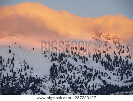 Mountains And Forest With Snow On The Background Of Clouds On A Sunny Day On The Island Of Evia (eub