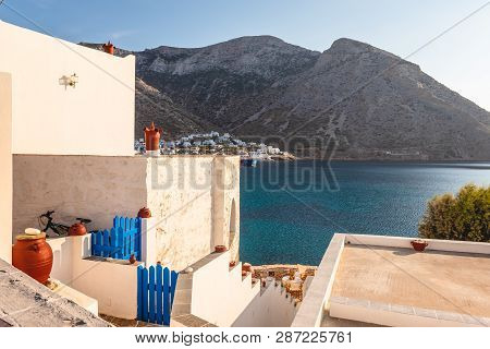 Sifnos, Greece - September 10, 2018: Traditional Greek House Overlooking The Bay In The Late Afterno